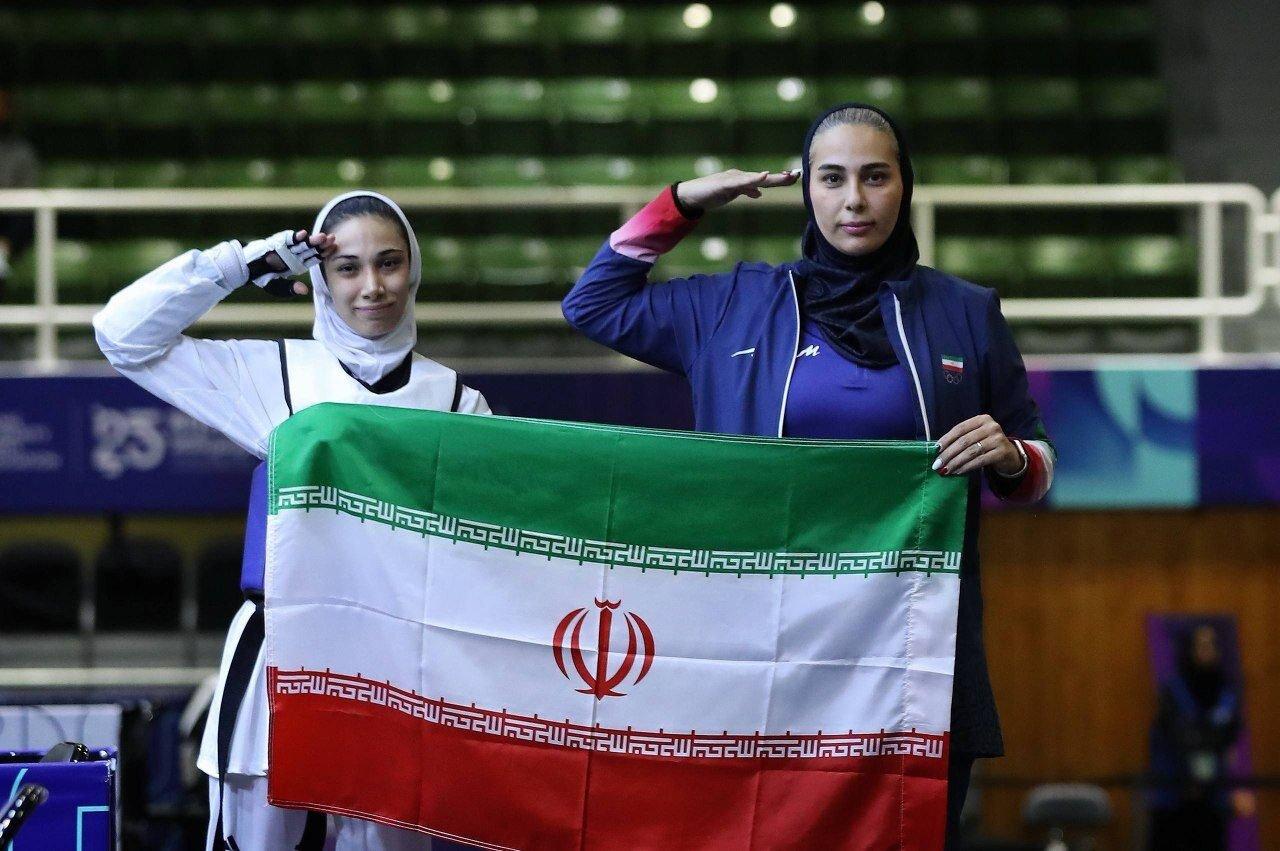 عکس از مهروز ساعی و ساینا کریمی تیم زنان تکواندو