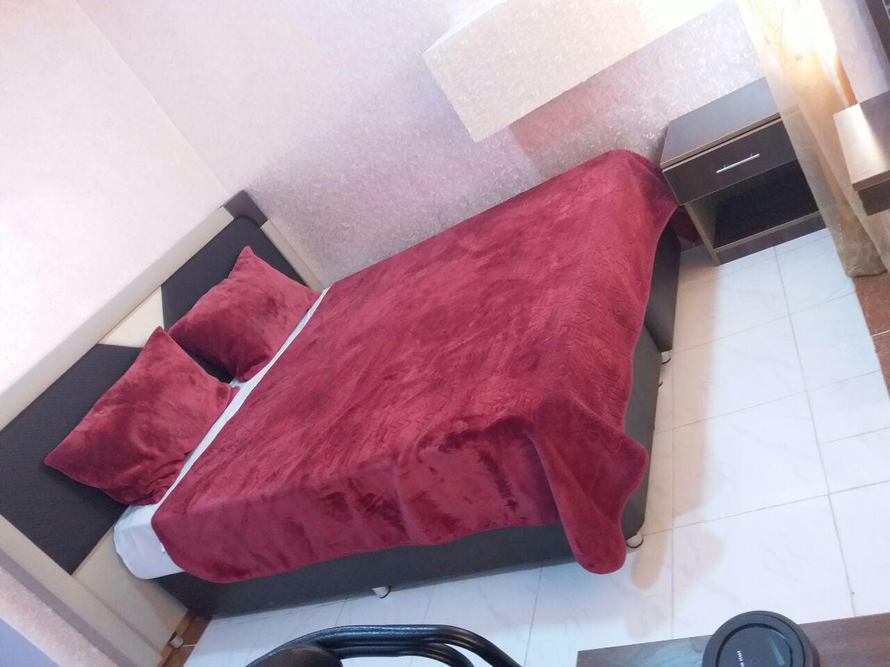 اتاق هتل آلاله مرکزی قشم با فرش و تخت دونفره