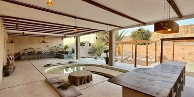 نشان و لوگوی اقامتگاه بوم‌گردی نی‌وا قشم